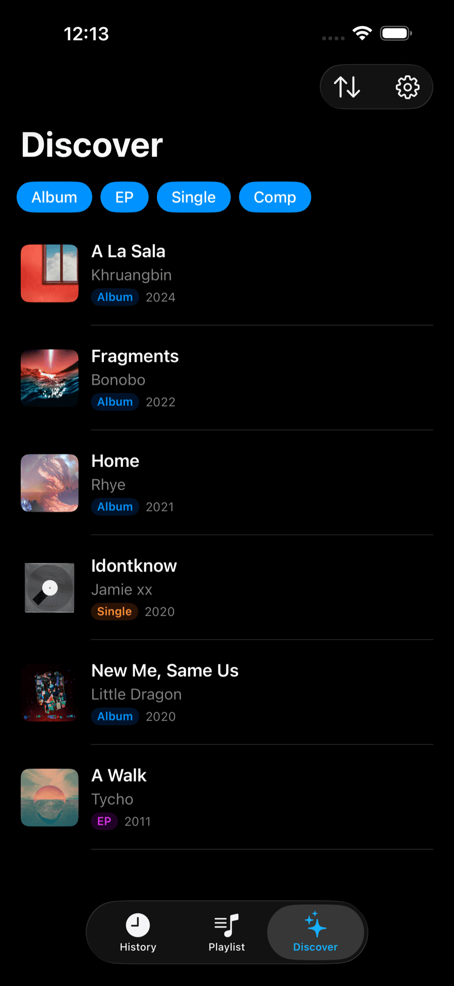 The Discover tab showing new releases from artists already in the library, filterable by Album, EP, Single, and Comp.